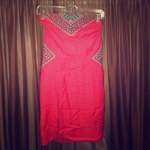 Hot pink strapless dress with embroidery